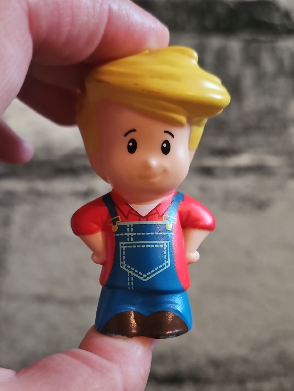 Fisher-Price Little People Eddie Farmer figure wearing blue overalls